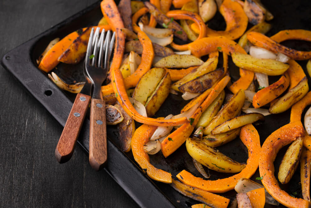 A flavorful and healthy recipe featuring roasted potatoes, carrots, and butternut squash seasoned to perfection, perfect for any occasion.